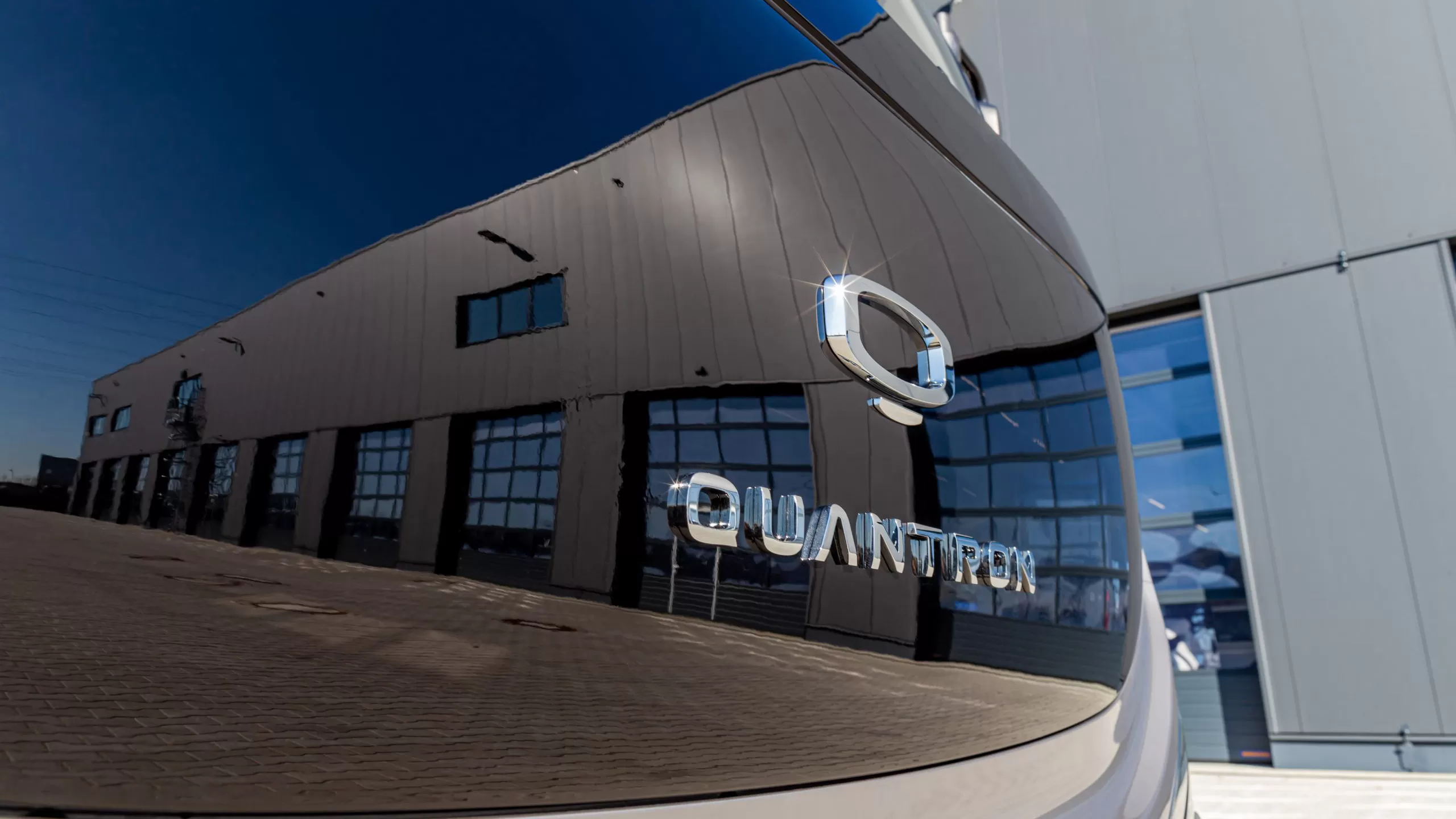 Quantron va prezenta camionul urban 100% electric Qargo 4 EV 3 The QUANTRON QARGO 4 EV Front details teaser scaled 1